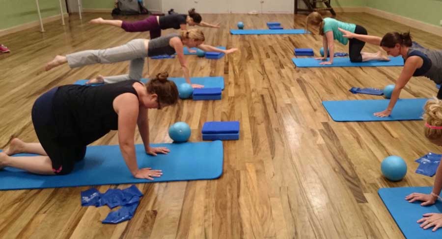 Group of women balancing